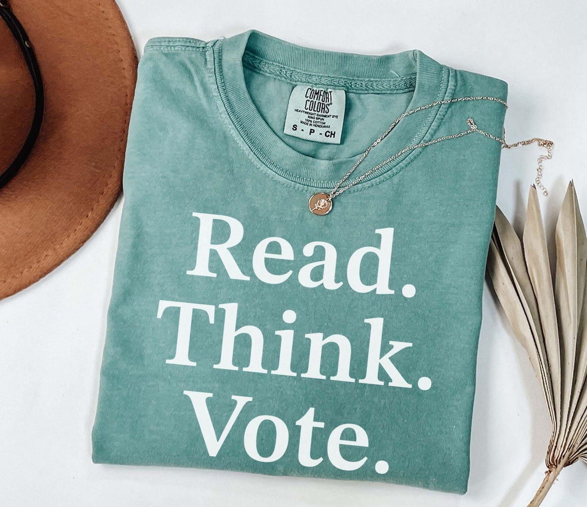A comfort colors® shirt with the saying "read think vote"