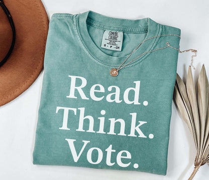 A comfort colors® shirt with the saying "read think vote"