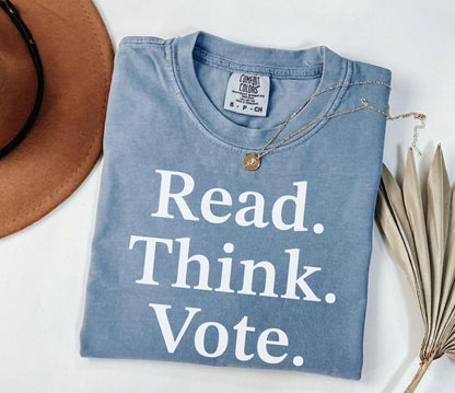 A comfort colors® shirt with the saying "read think vote"