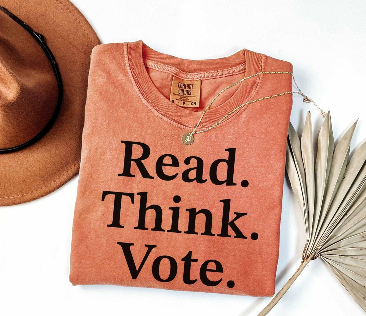 A comfort colors® shirt with the saying "read think vote"