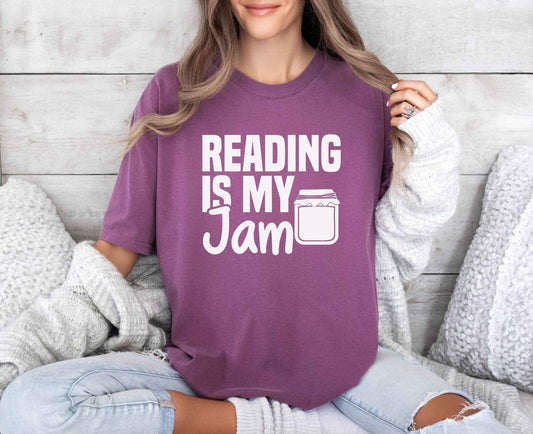 A comfort colors® shirt with the saying "Reading is my jam"