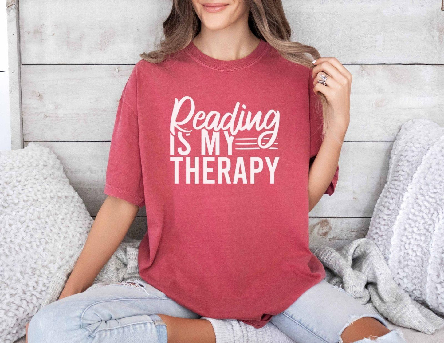 A comfort colors® shirt with the saying "Reading is my therapy"