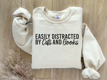 Easily Distracted By Cats And Books Sweatshirt