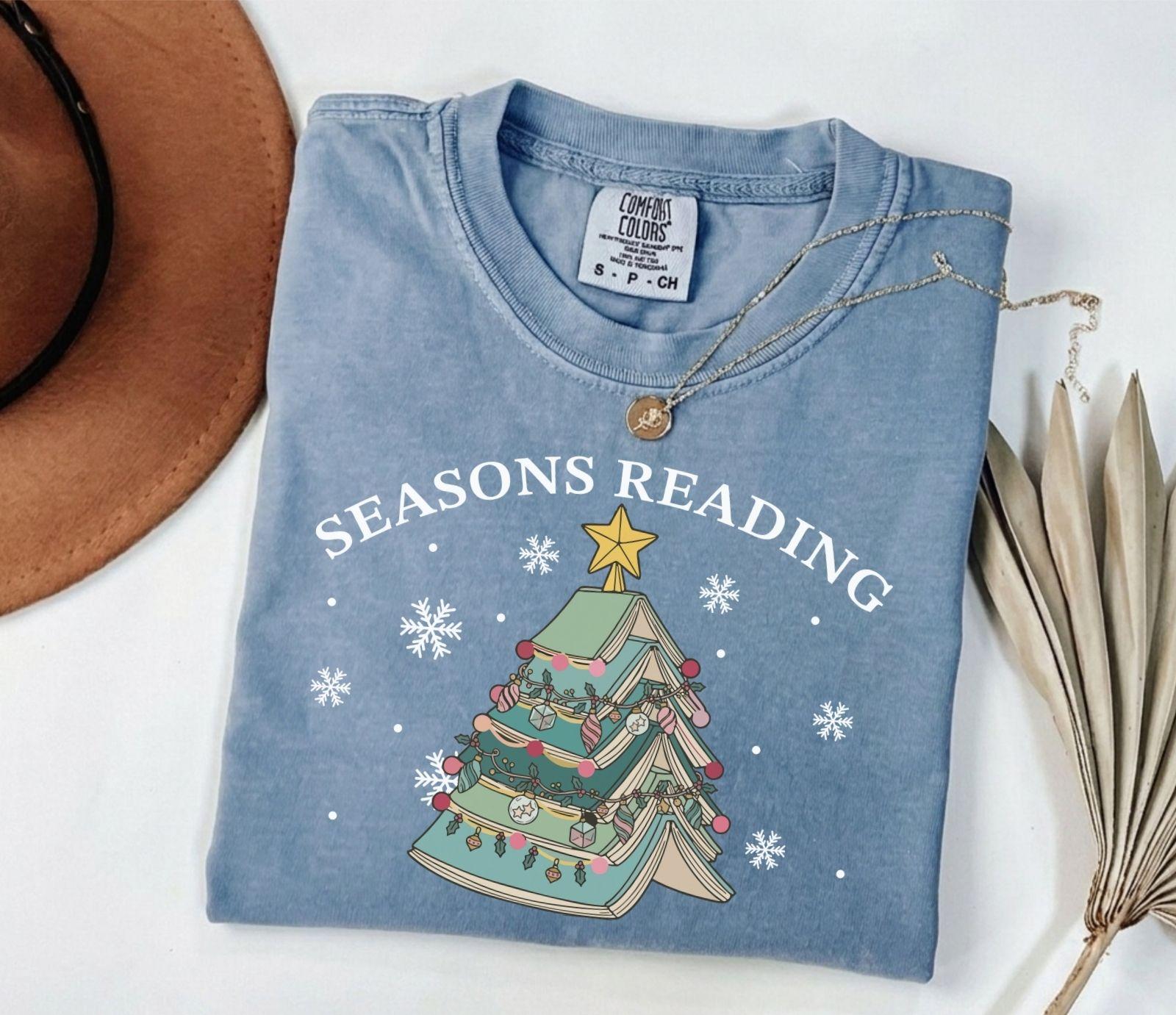 A comfort colors® shirt with the saying "Seasons reading"