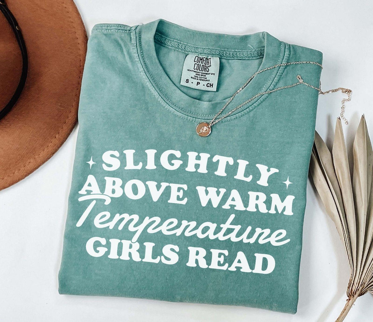 A comfort colors® shirt with the saying "slightly above warm temperature girls read"