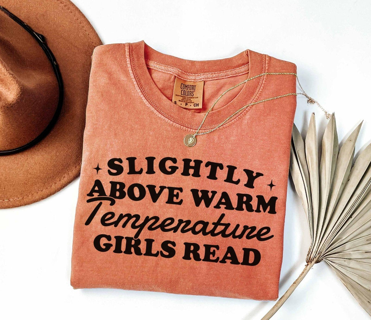 A comfort colors® shirt with the saying "slightly above warm temperature girls read"