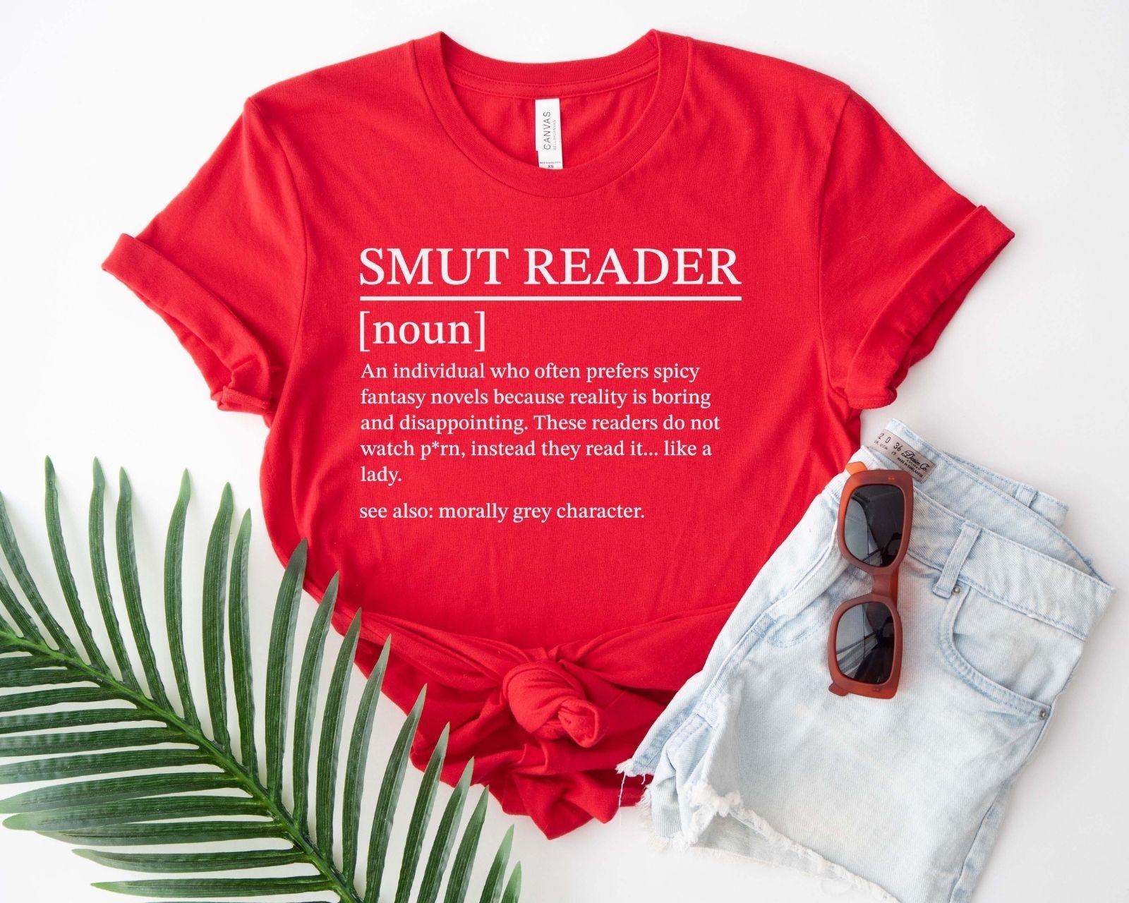 A bella canvas 3001 shirt with the saying "smut reader definition"