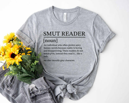 A bella canvas 3001 shirt with the saying "smut reader definition"