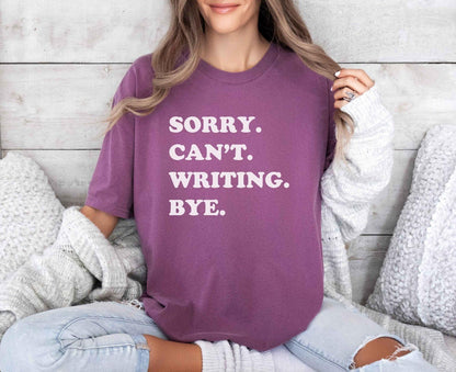 A comfort colors® shirt with the saying "sorry can't writing bye"