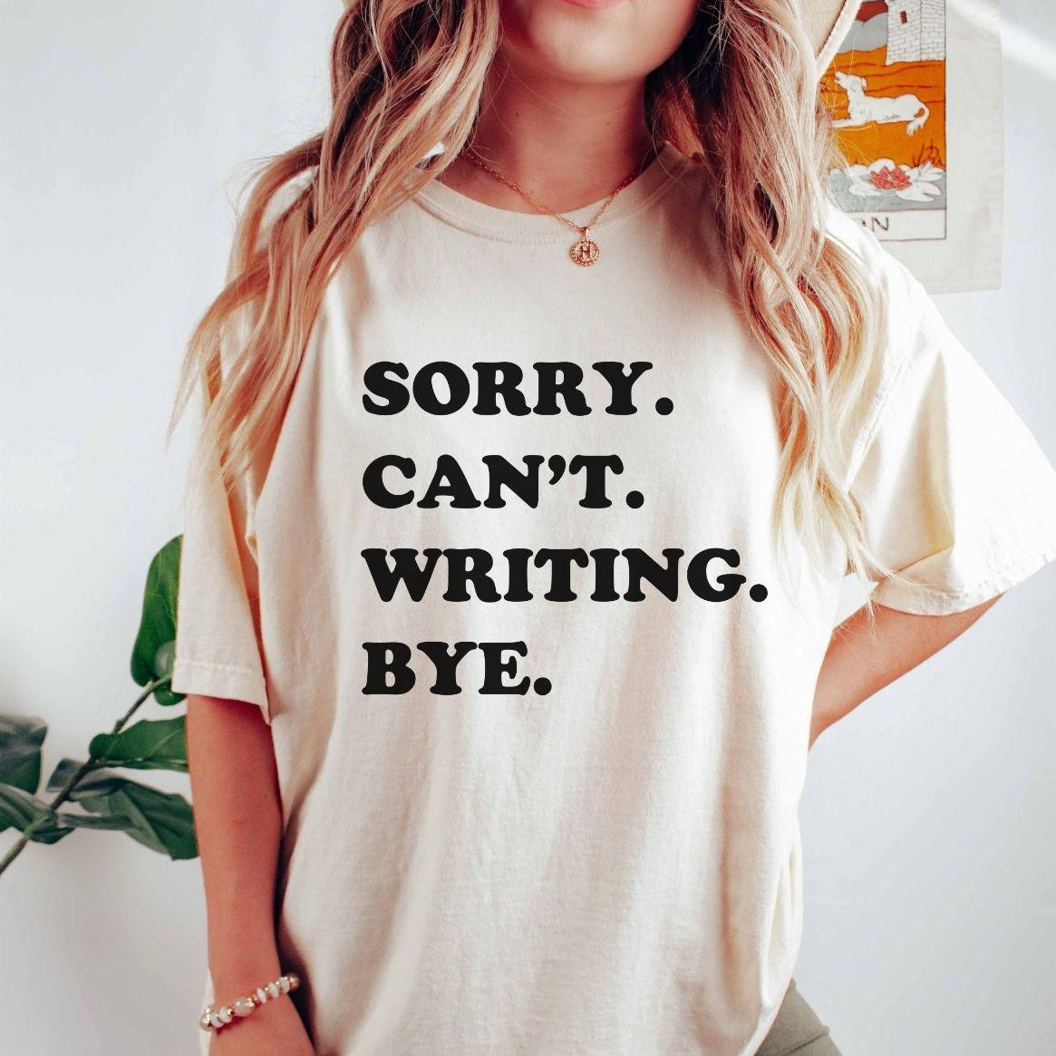 A comfort colors® shirt with the saying "sorry can't writing bye"