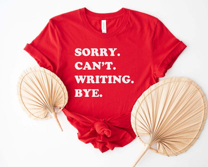 A comfort colors® shirt with the saying "sorry can't writing bye"