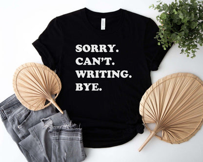 A comfort colors® shirt with the saying "sorry can't writing bye"