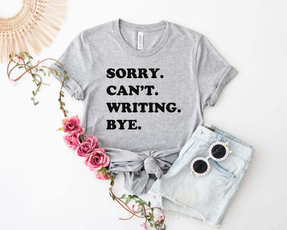 A comfort colors® shirt with the saying "sorry can't writing bye"