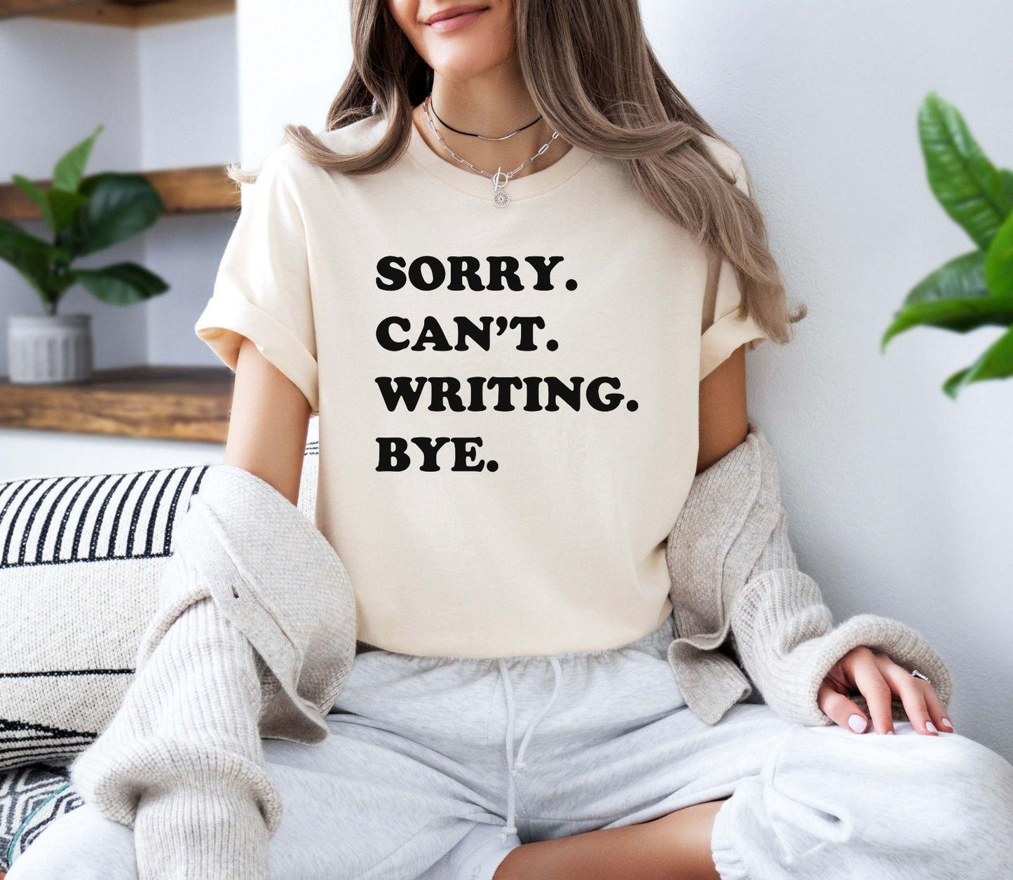 A comfort colors® shirt with the saying "sorry can't writing bye"