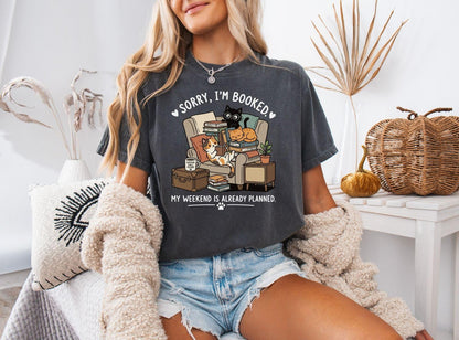 A comfort colors® shirt with the saying "sorry I'm booked my weekend is already planned"