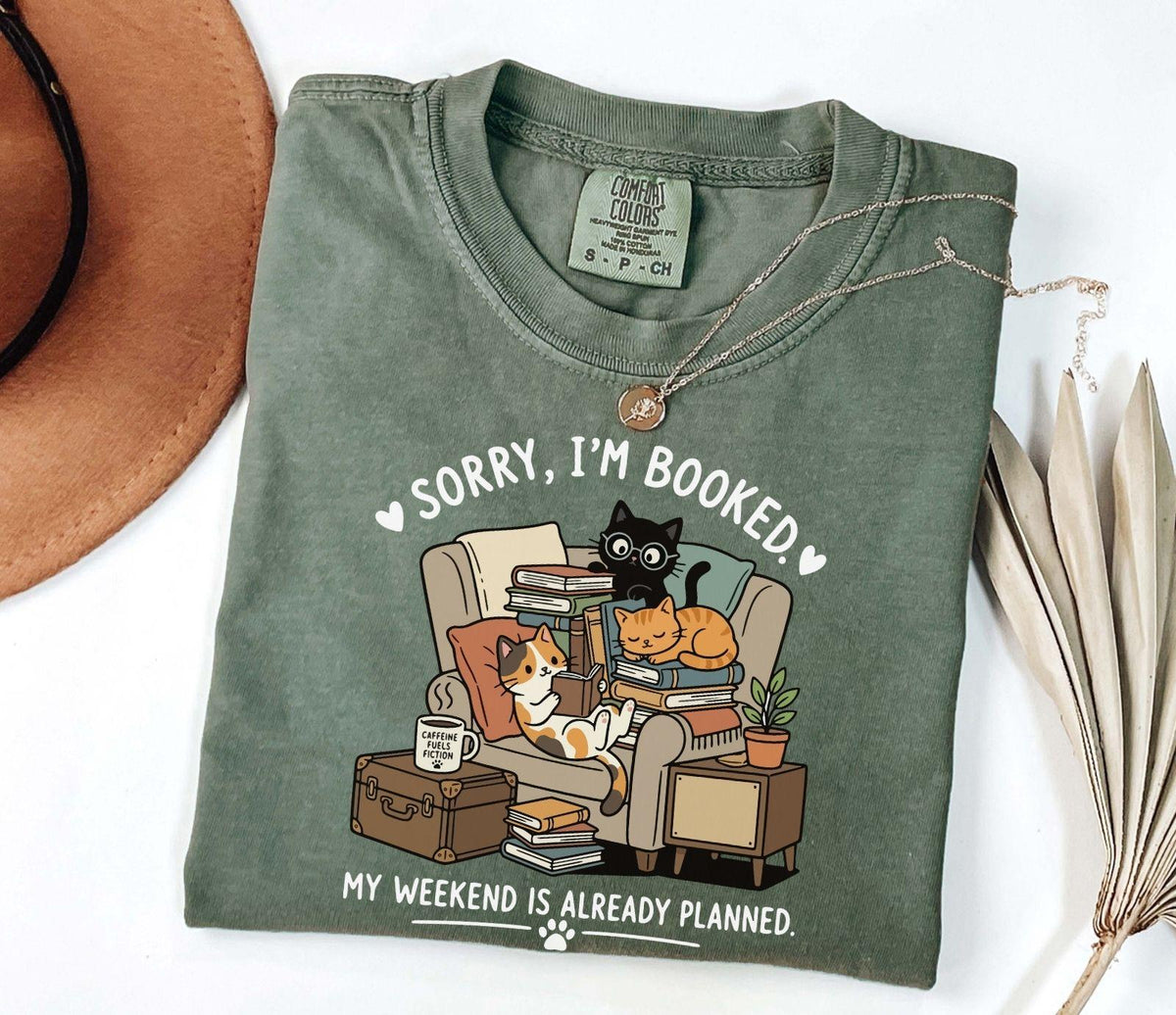 A comfort colors® shirt with the saying "sorry I'm booked my weekend is already planned"