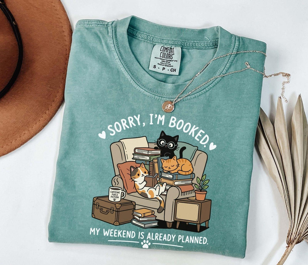 A comfort colors® shirt with the saying "sorry I'm booked my weekend is already planned"