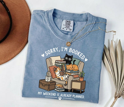 A comfort colors® shirt with the saying "sorry I'm booked my weekend is already planned"