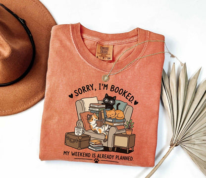 A comfort colors® shirt with the saying "sorry I'm booked my weekend is already planned"