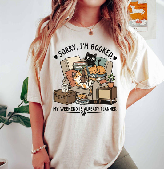 A comfort colors® shirt with the saying "sorry I'm booked my weekend is already planned"