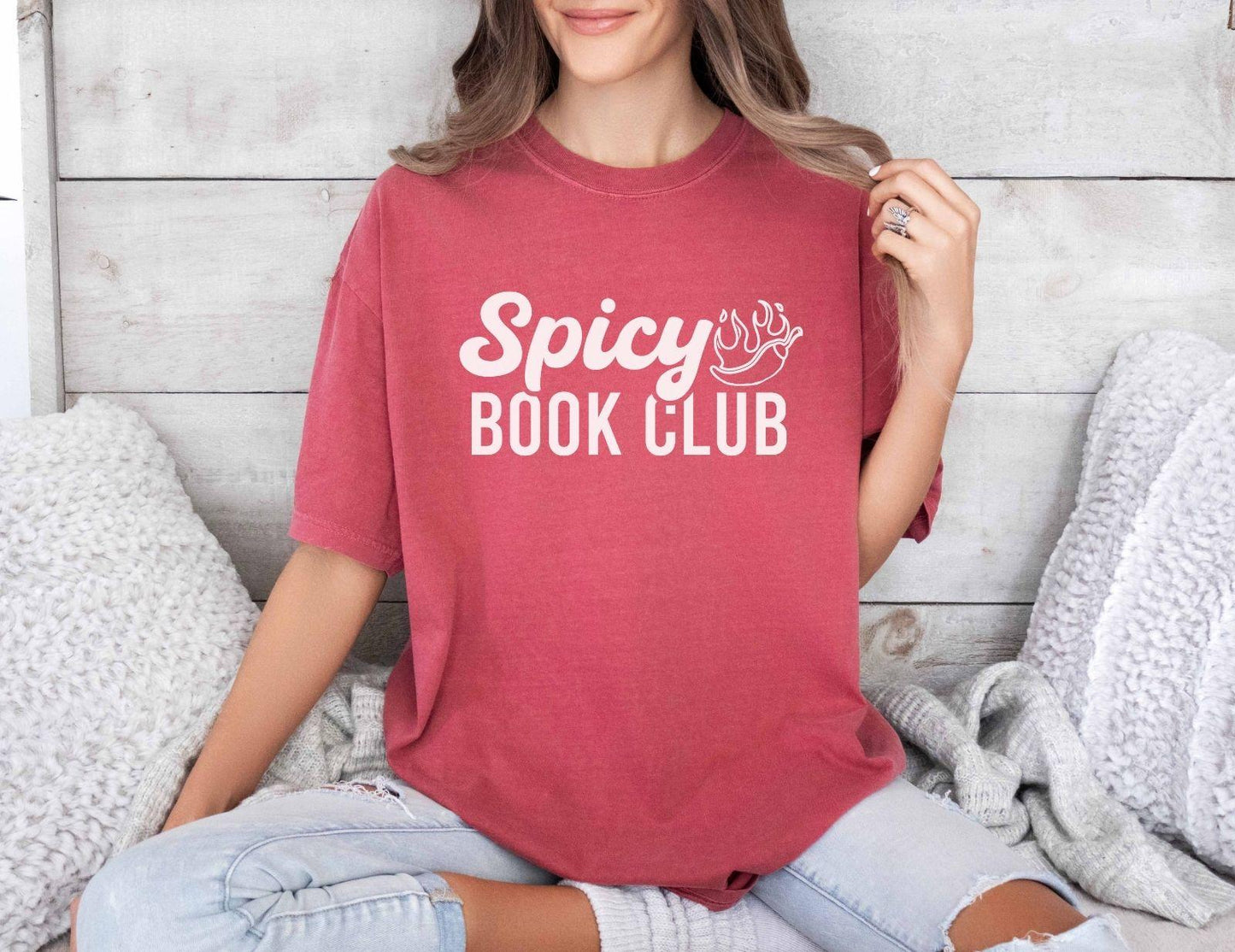 A comfort colors shirt with the saying "Spicy book club"