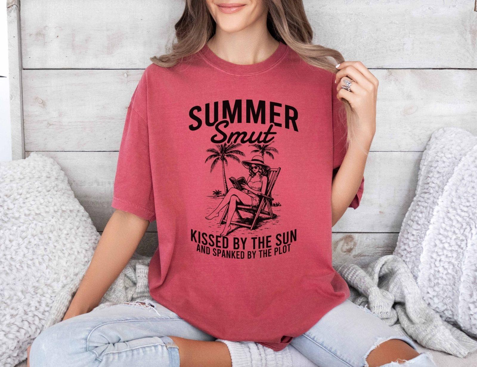A comfort colors shirt with the saying "Summer smut kissed by the sun"