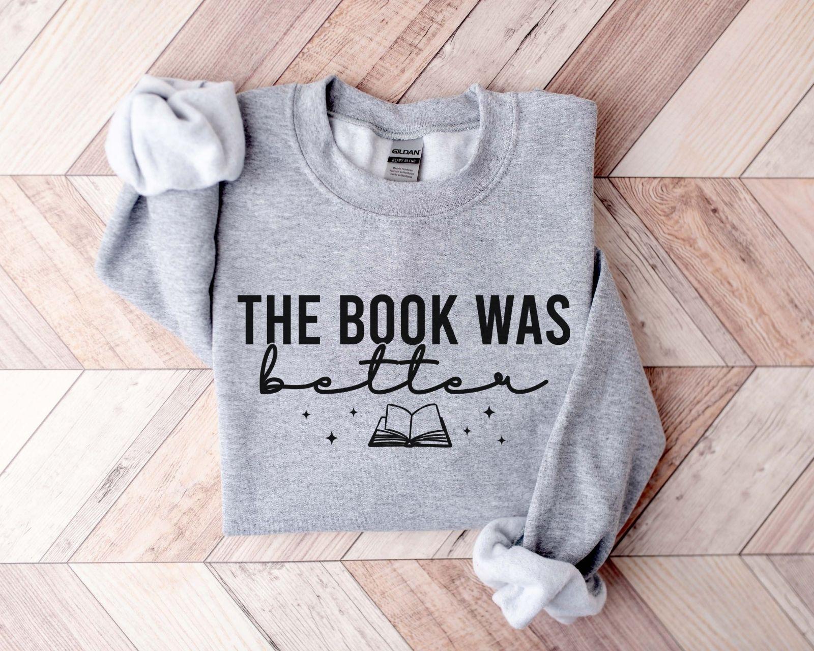 A comfort colors® shirt with the saying "the book was better"