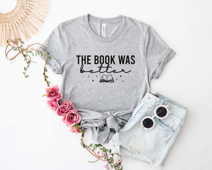 A comfort colors® shirt with the saying "The book was better"