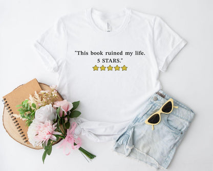 A bella canvas 3001 shirt with the saying "this book ruined my life 5 stars"
