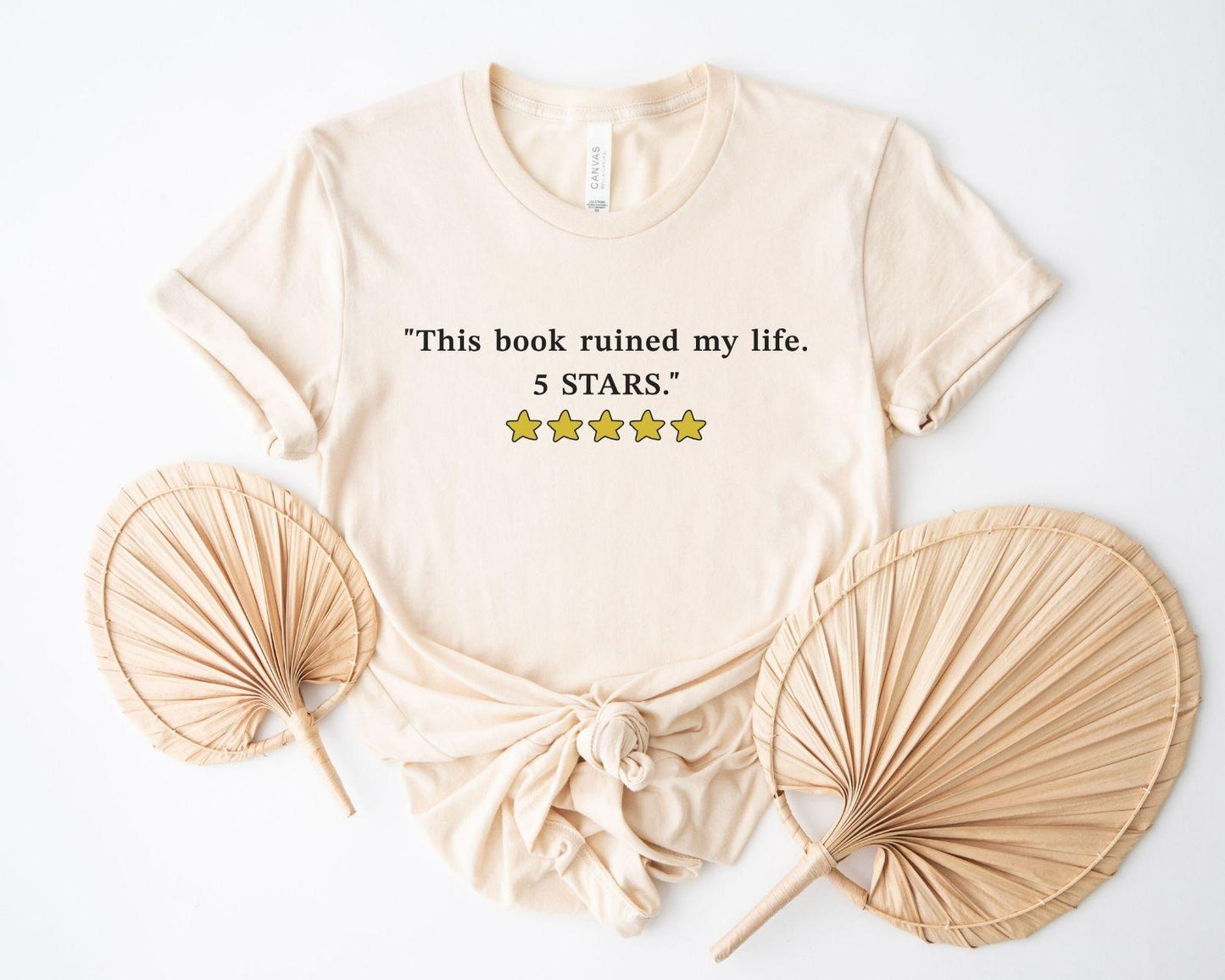 A bella canvas 3001 shirt with the saying "this book ruined my life 5 stars"