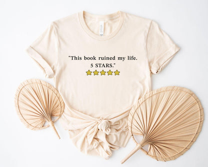 A bella canvas 3001 shirt with the saying "this book ruined my life 5 stars"