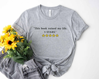 A bella canvas 3001 shirt with the saying "this book ruined my life 5 stars"