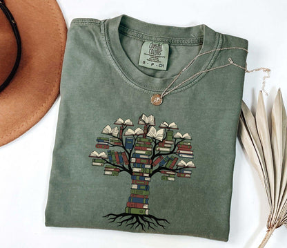 A comfort colors® shirt with the saying "tree books"