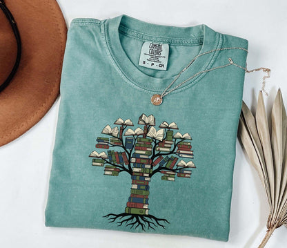 A comfort colors® shirt with the saying "tree books"