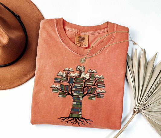 A comfort colors® shirt with the saying "tree books"