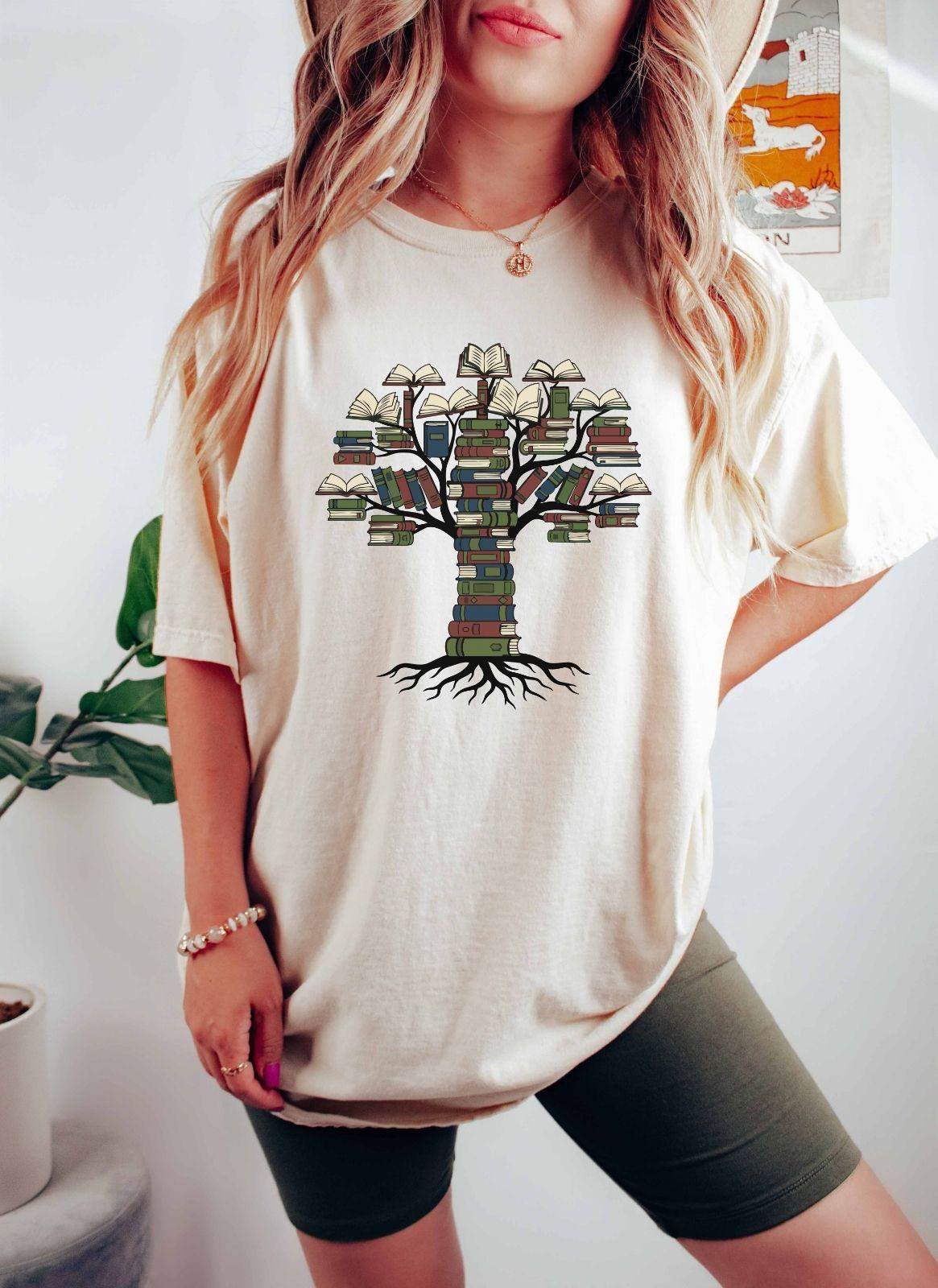A comfort colors® shirt with the saying "tree books"