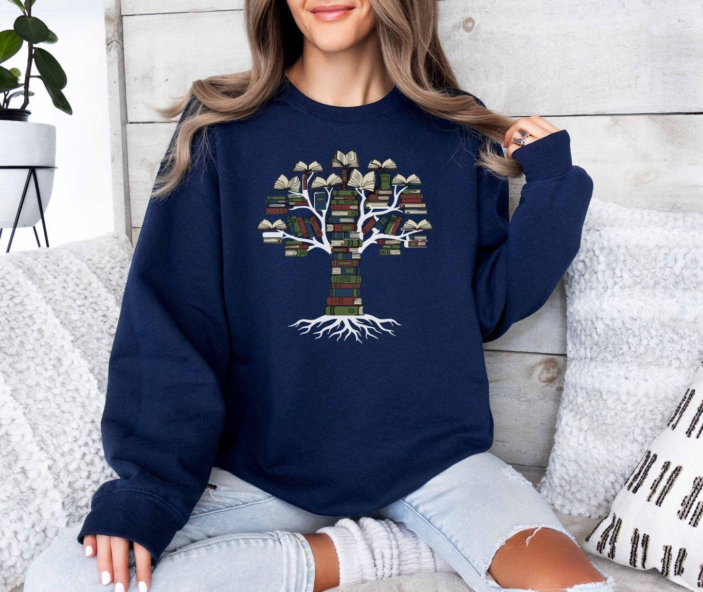 A Gildan 18000 sweatshirt with the saying "books tree graphic"