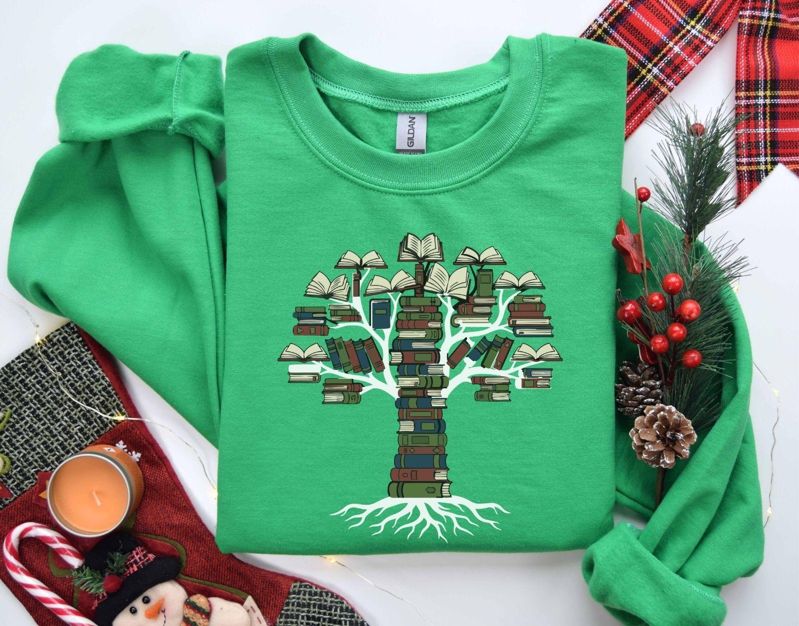 A Gildan 18000 sweatshirt with the saying "books tree graphic"