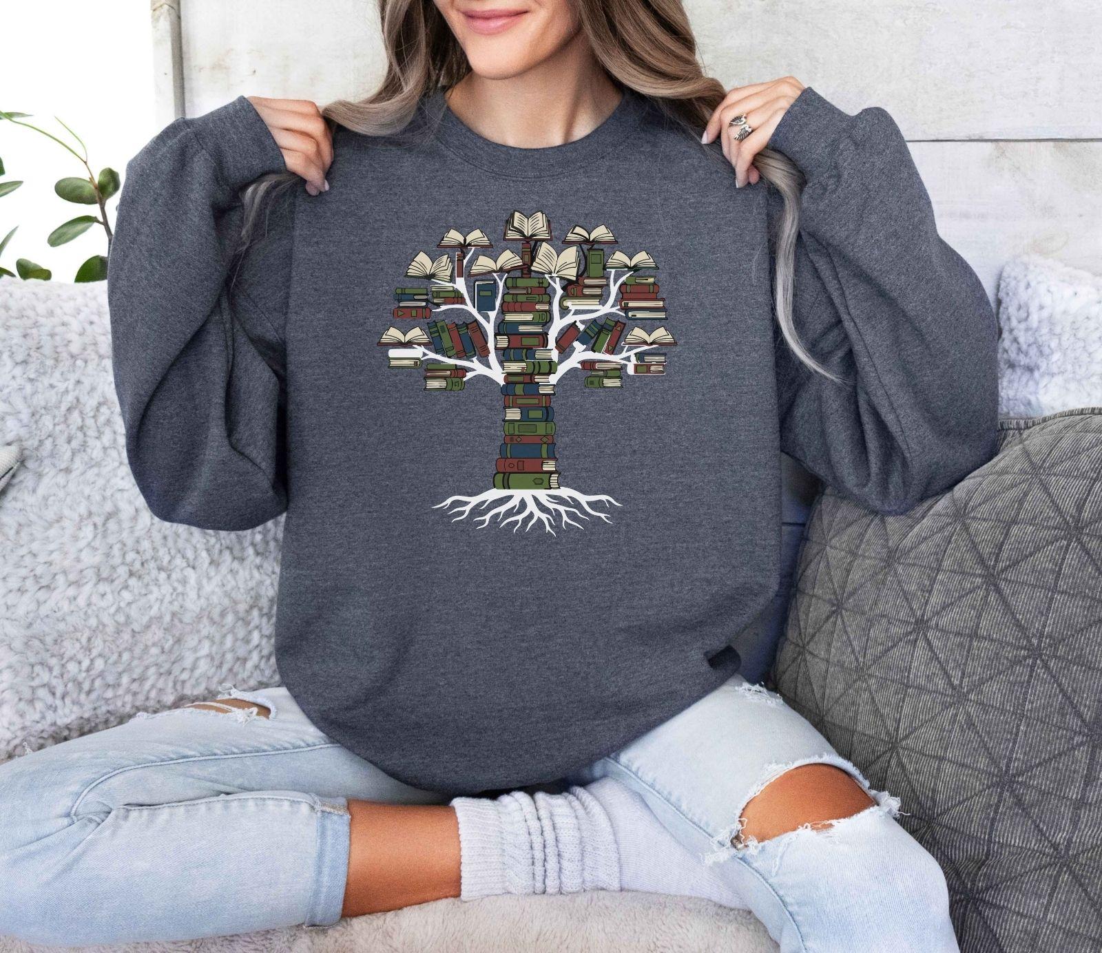 A Gildan 18000 sweatshirt with the saying "books tree graphic"