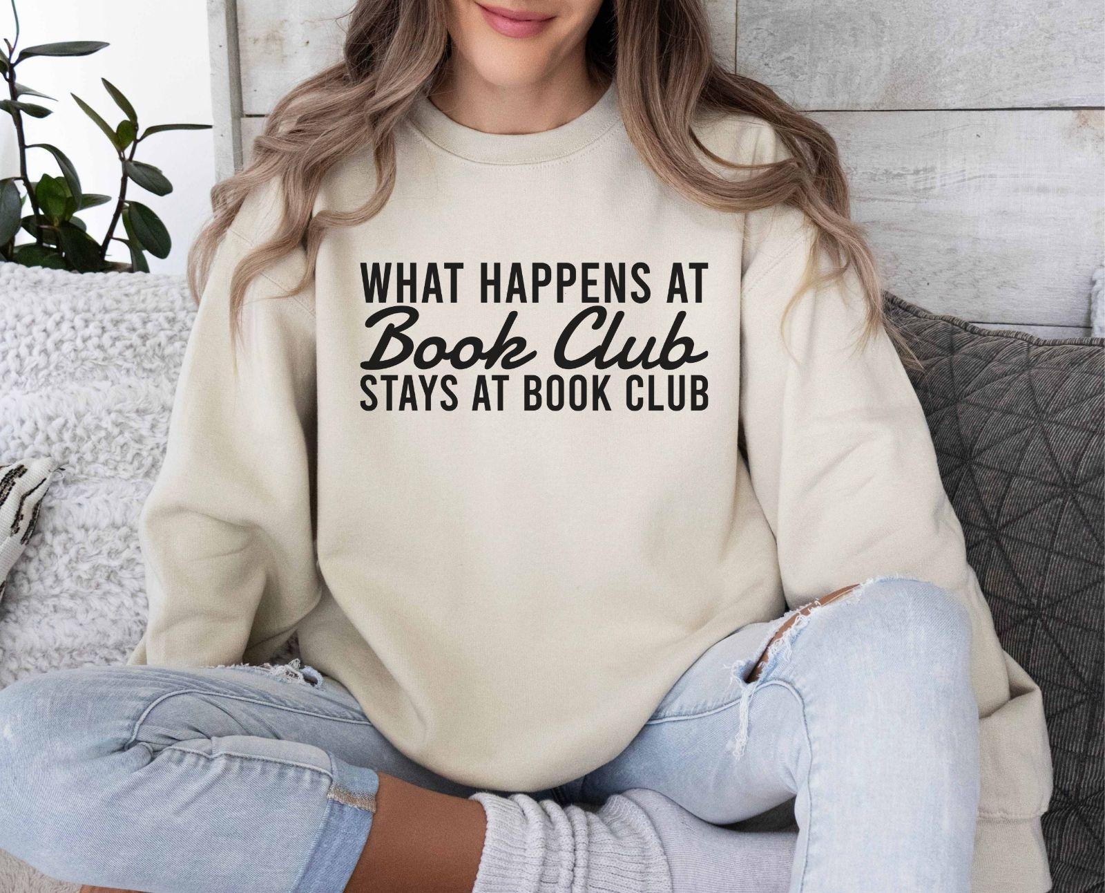 A comfort colors® shirt with the saying "what happens at book club stays at book club"