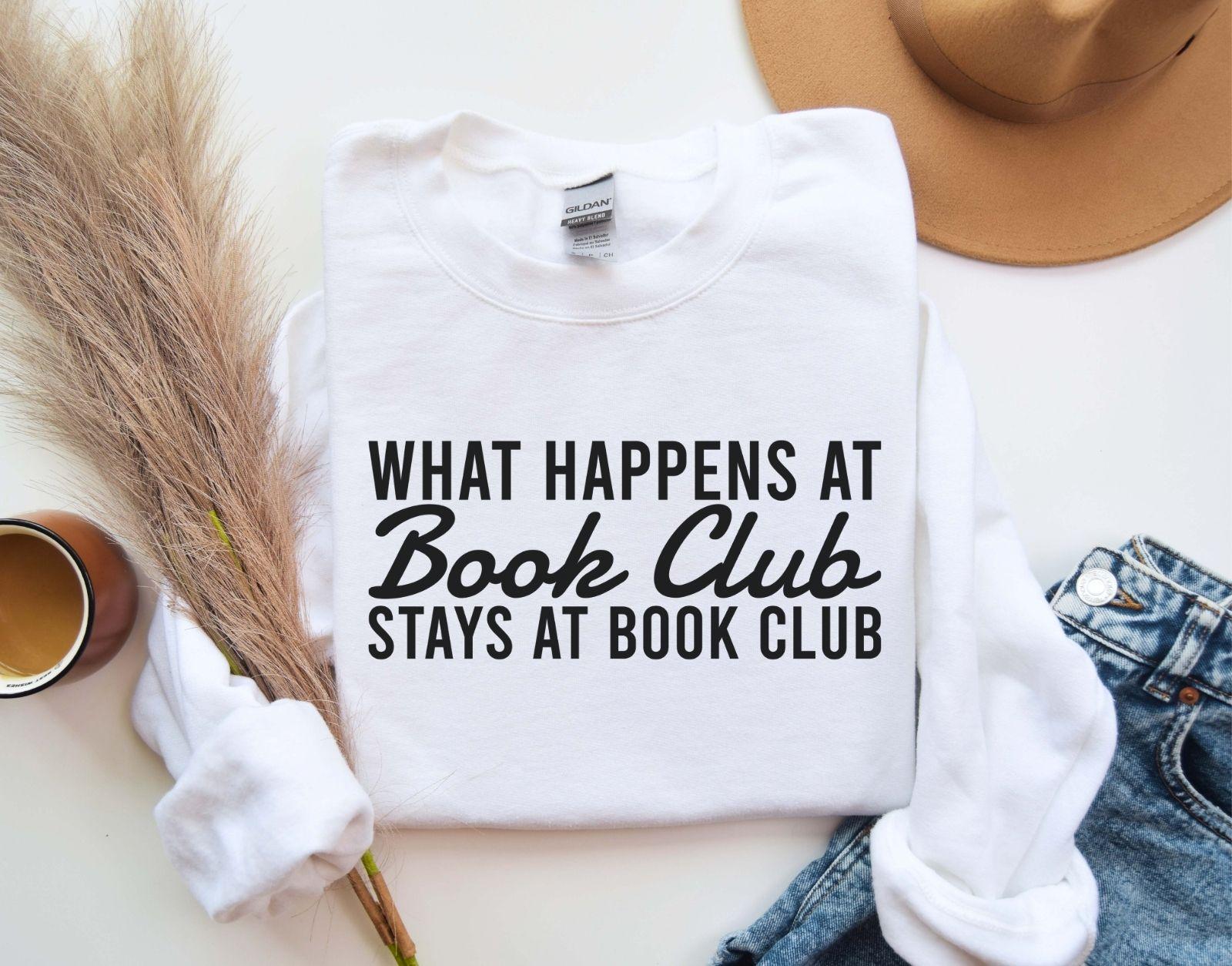 A comfort colors® shirt with the saying "what happens at book club stays at book club"