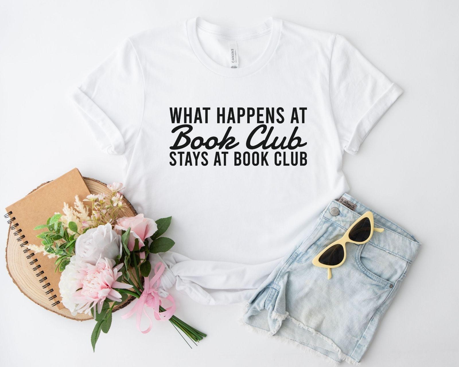 A comfort colors® shirt with the saying "what happens at book club stays at book club"