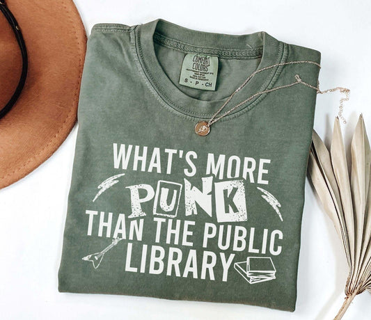 A comfort colors shirt with the saying "What's more punk than the public library"