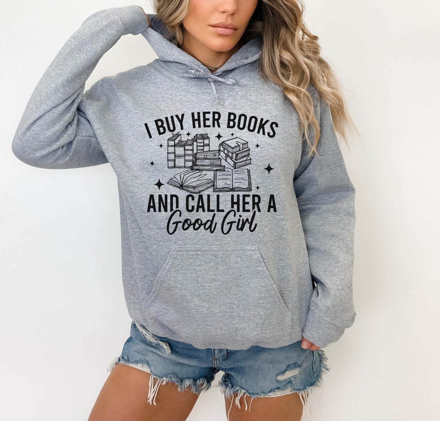 Person wearing a sport grey hoodie with a book-themed design and text.